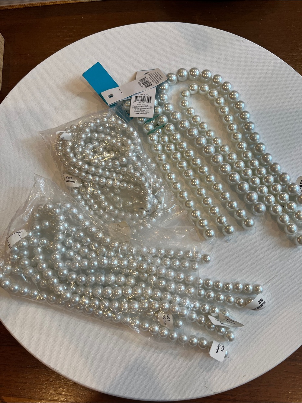 White glass pearls for jewelry making or crafts